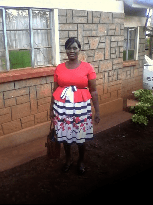 Damaris Kambi Posing for a photo